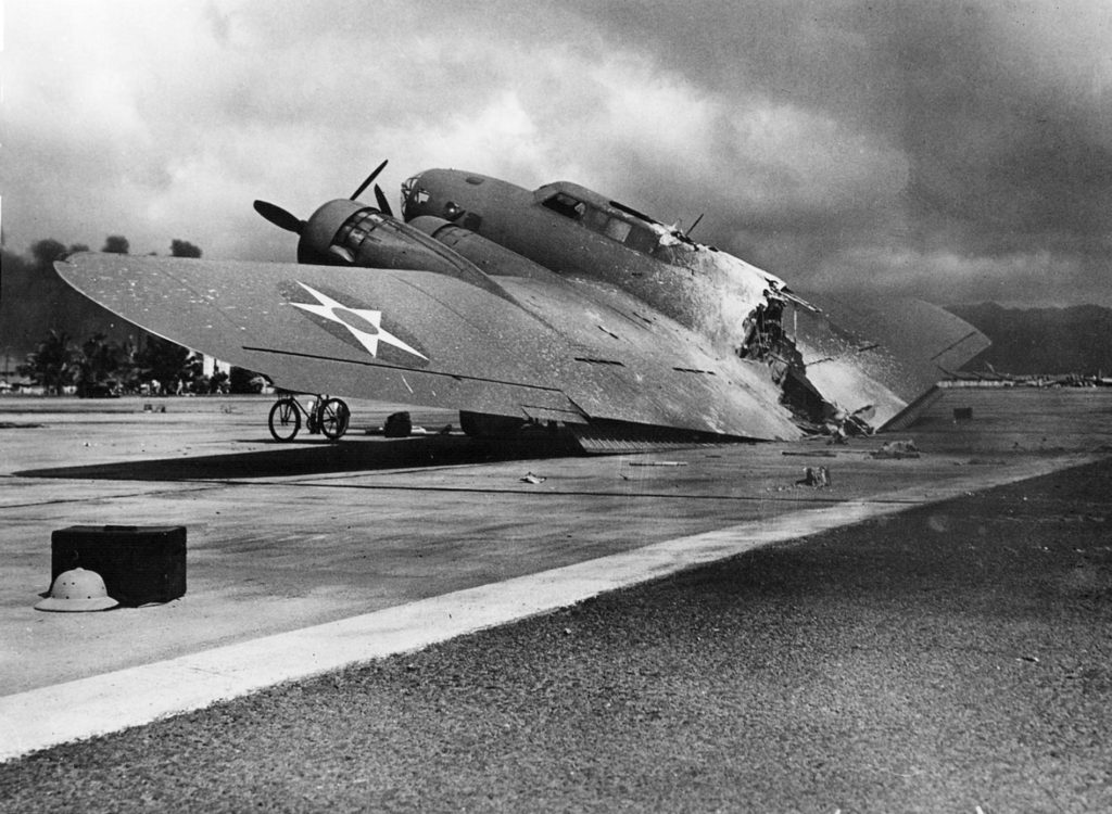 Burned B-17C Flying Fortress broken in two at Hickam Field after the Pearl Harbor attack