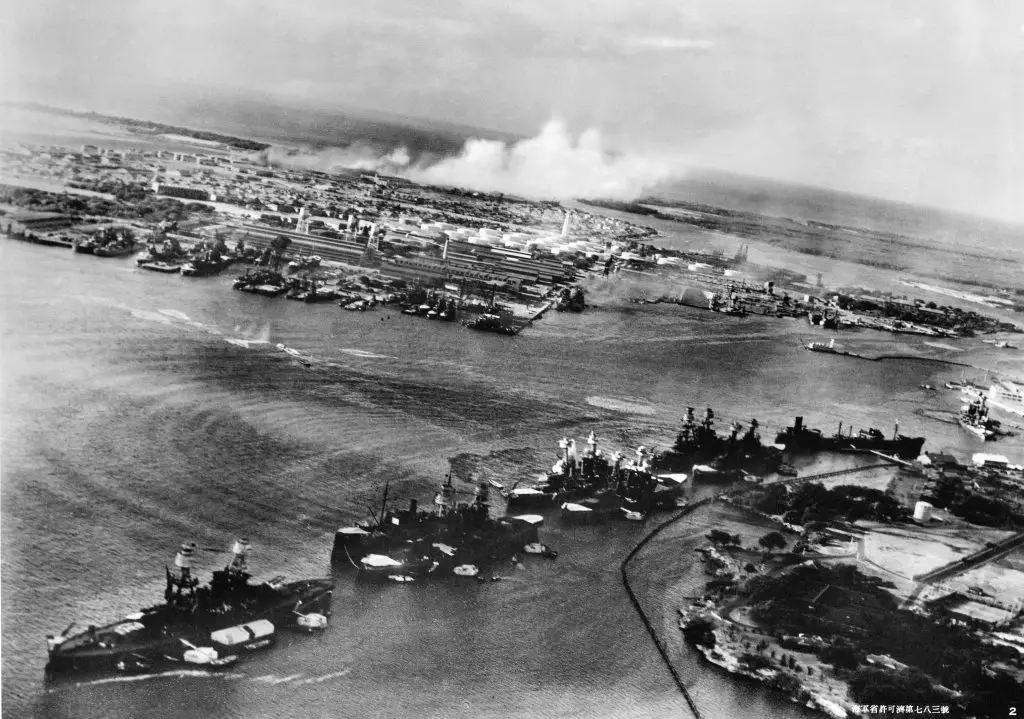 Battleship Row under torpedo attack at Pearl Harbor, photographed from a Japanese aircraft